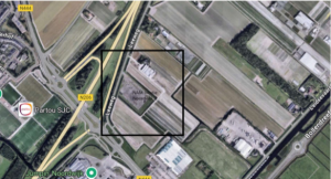 Luchtfoto met zwart omcirkeld gebied.